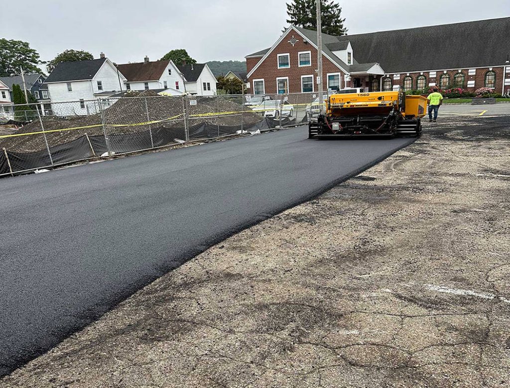 A road with a machine on the side.